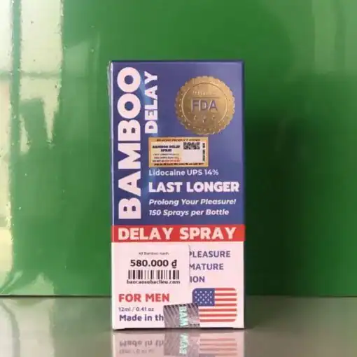 Xịt chống xuất tinh sớm Bamboo Delay 12ml – hộp Bamboo Delay tím nền xanh lá, có giá tiền